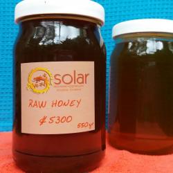 glass jar of sweet honey