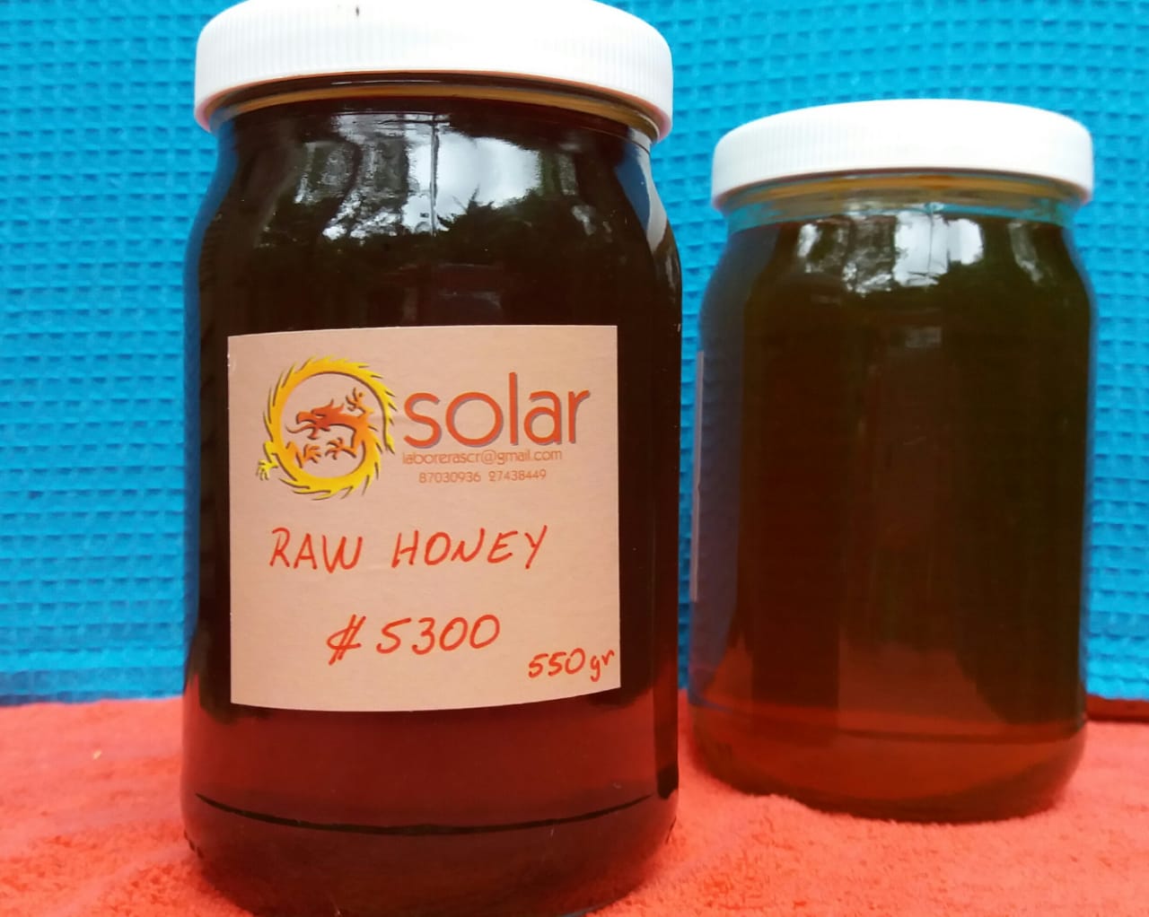 glass jar of sweet honey