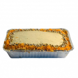 Traditional carrot cake with cream cheese icing lightly topped with seed mix & grated carrots.